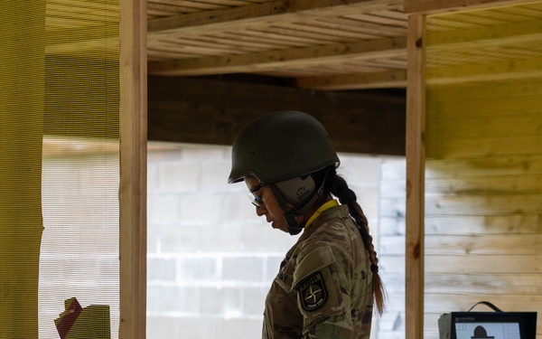 1st Lt. Jessica Romero loads a magazine