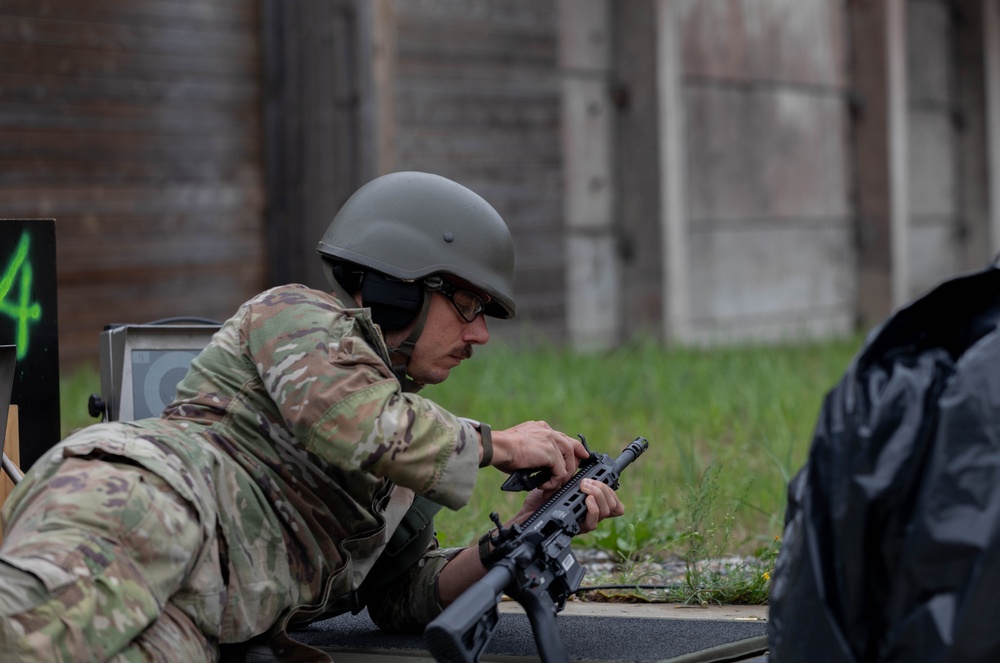 Lt. Col. James Fink adjusts front sight picture