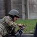 Lt. Col. James Fink adjusts front sight picture