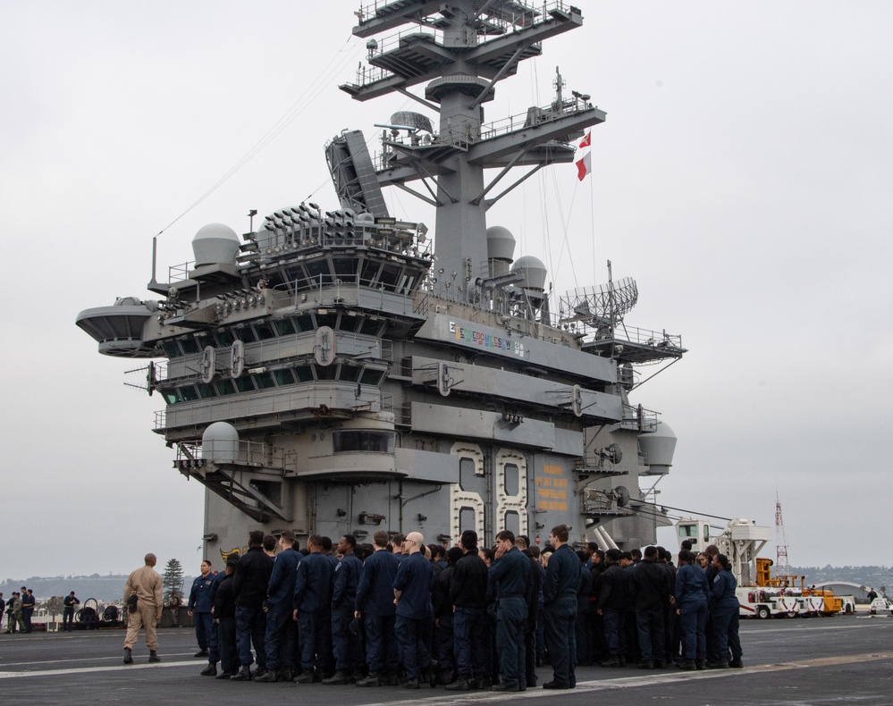 Nimitz Sailors Muster On The Flight Deck