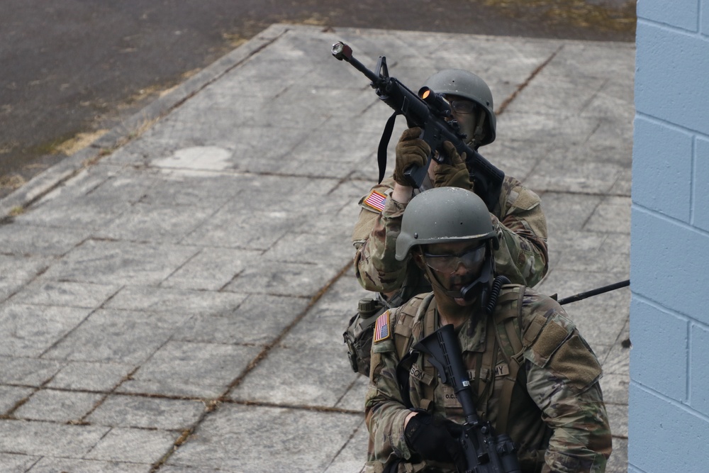 Officer candidates assault a mock city