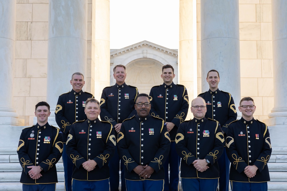 The US Army Band “Pershing’s Own” tuba section takes official photo in Arlington National Cemetery