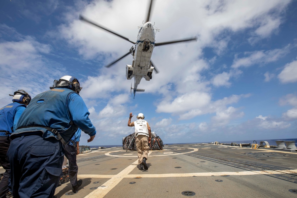 USS Spruance conducts vertical replenishment with USNS Wally Schirra