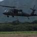 Explosive Ordnance Disposal technician rappels from U.S. Army UH-60 Black Hawk during RIMPAC 2024