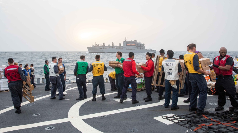 USS Russell Conducts a VERTREP with USNS Alan Shepard