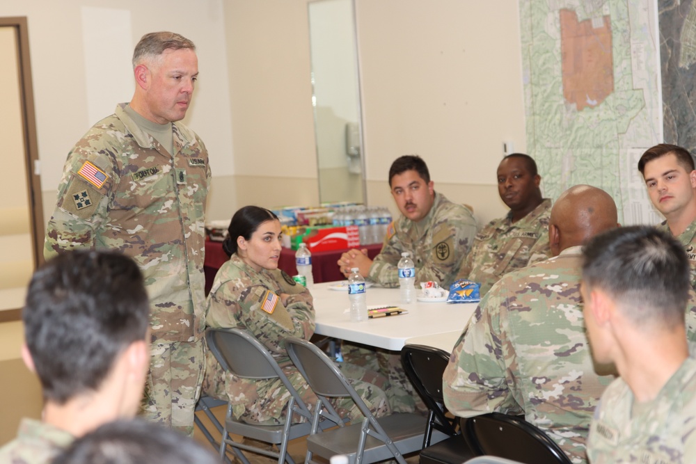 Command Sergeant Major Alexander L. Poutou, Medical Readiness Command, East, visits Ireland Army Health Clinic.