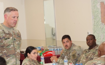 Command Sergeant Major Alexander L. Poutou, Medical Readiness Command, East, visits Ireland Army Health Clinic.