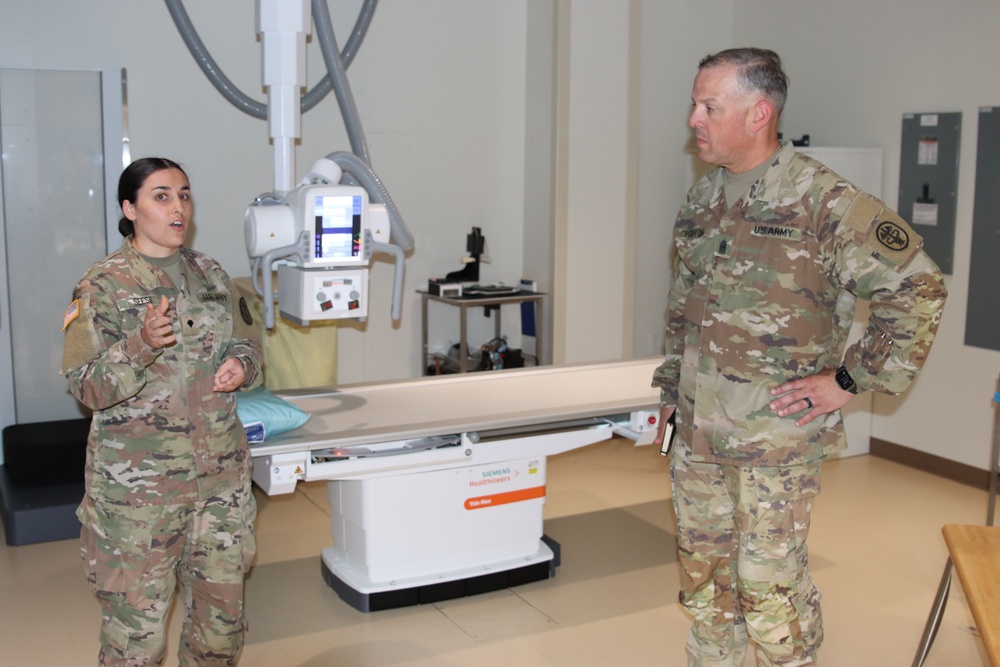 Command Sergeant Major Alexander L. Poutou, Medical Readiness Command, East, visits Ireland Army Health Clinic.