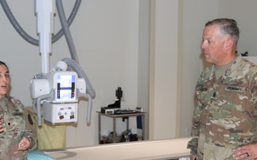 Command Sergeant Major Alexander L. Poutou, Medical Readiness Command, East, visits Ireland Army Health Clinic.