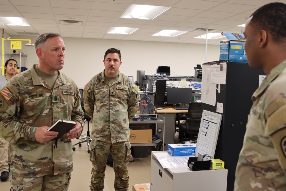 Command Sergeant Major Alexander L. Poutou, Medical Readiness Command, East, visits Ireland Army Health Clinic.