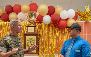 Commandant Gen. Eric M. Smith awards the WPT Hill Award to the MCAS Yuma Mess Hall