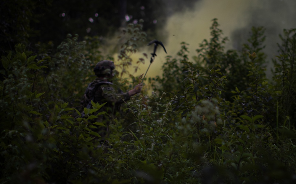 Charlie Co. of the 1-167th Infantry Regiment assaults an enemy position