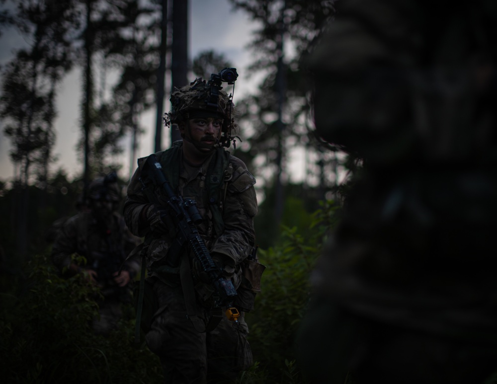 Charlie Co. of the 1-167th Infantry Regiment assaults an enemy position