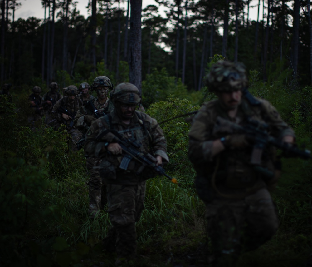 Charlie Co. of the 1-167th Infantry Regiment assaults an enemy position