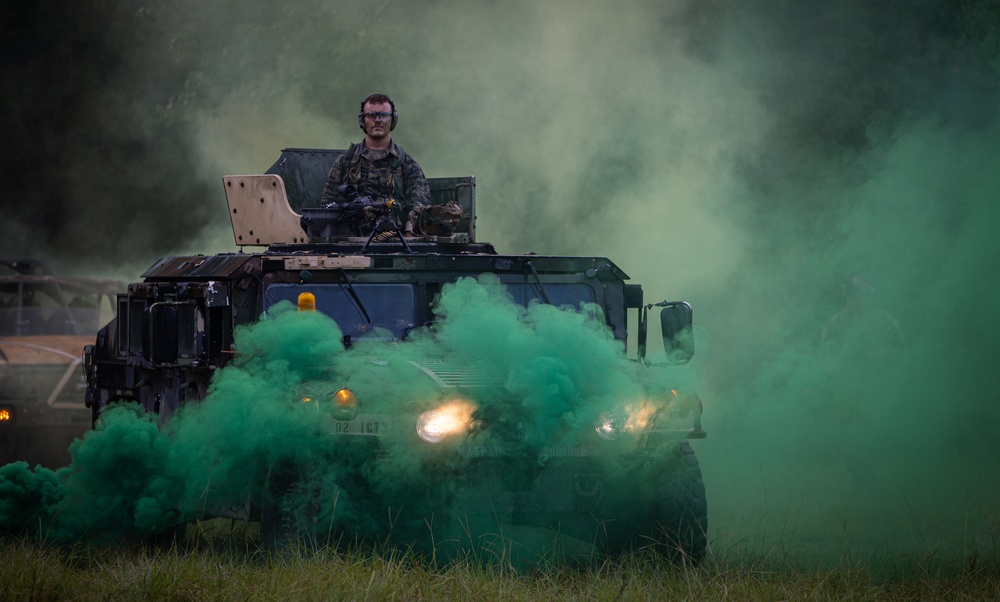 Charlie Co. of the 1-167th Infantry Regiment assaults an enemy position