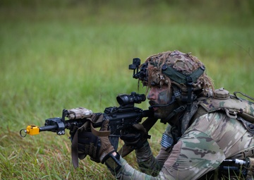 Charlie Co. of the 1-167th Infantry Regiment assaults an enemy position