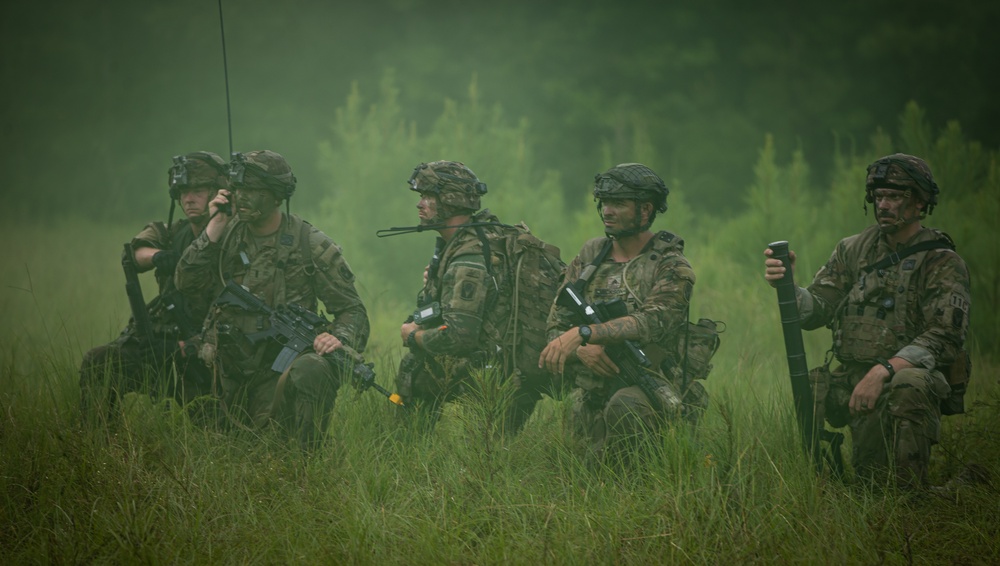 Charlie Co. of the 1-167th Infantry Regiment assaults an enemy position