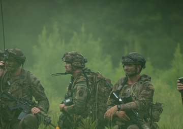 Charlie Co. of the 1-167th Infantry Regiment assaults an enemy position