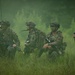 Charlie Co. of the 1-167th Infantry Regiment assaults an enemy position
