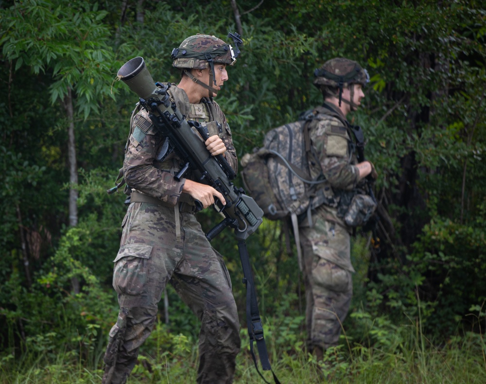 Charlie Co. of the 1-167th Infantry Regiment assaults an enemy position