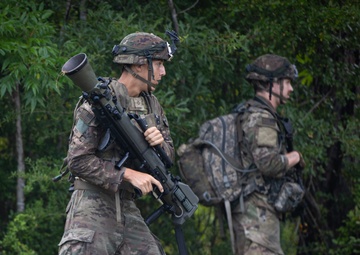 Charlie Co. of the 1-167th Infantry Regiment assaults an enemy position