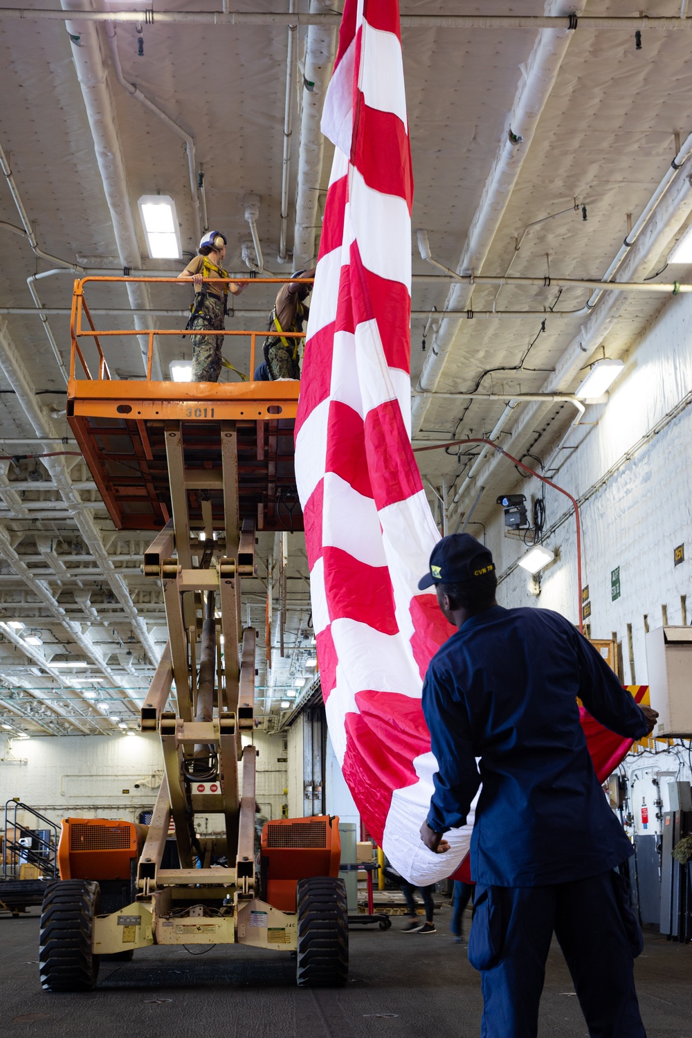 USS Gerald R. Ford (CVN 78) Sailors Rig the Colors