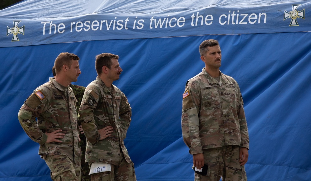 Service members prepare to conduct land obstacle course
