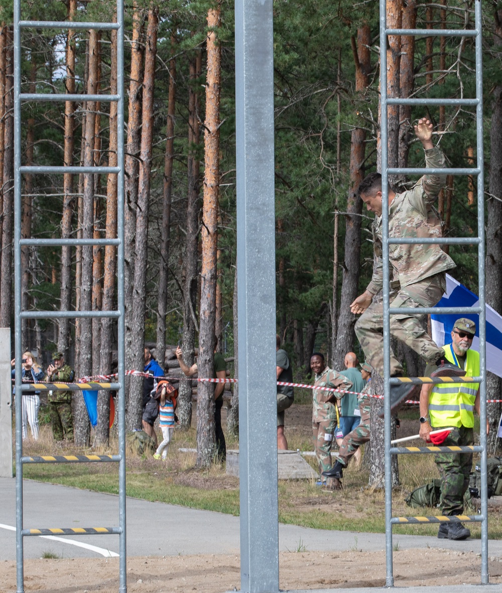 Staff Sgt. James Lavoie jumps off a obstacle