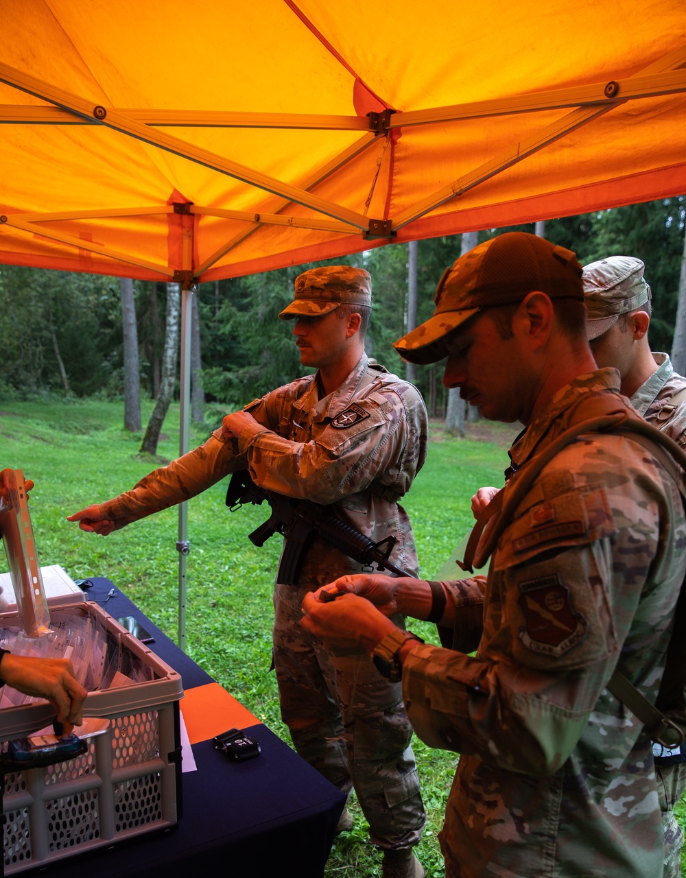 Service members receive gear to conduct land navigation competition