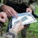 Service members  navigate during a orienteering competition