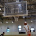 Coaches from Basketball Japan Academy coach children at the Youth Sports Summer Basketball Camp