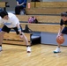 Coaches from Basketball Japan Academy coach children at the Youth Sports Summer Basketball Camp