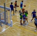 Coaches from Basketball Japan Academy coach children at the Youth Sports Summer Basketball Camp