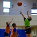 Coaches from Basketball Japan Academy coach children at the Youth Sports Summer Basketball Camp