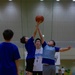 Coaches from Basketball Japan Academy coach children at the Youth Sports Summer Basketball Camp