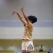 Coaches from Basketball Japan Academy coach children at the Youth Sports Summer Basketball Camp