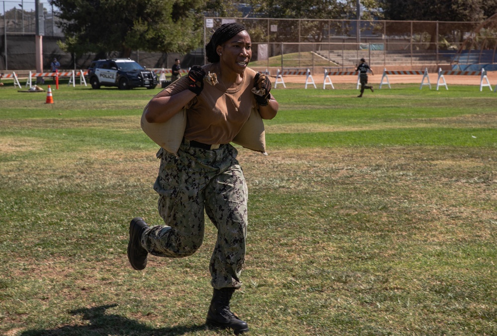 U.S. Navy competes in Sand Bag Relay