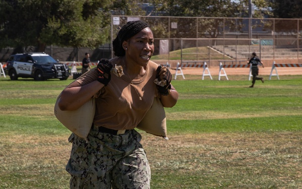 U.S. Navy competes in Sand Bag Relay