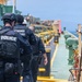 USCG Sector Board Team and Customs and Border Protection conducts a High-Interest Vessel inspection off Long Beach, California