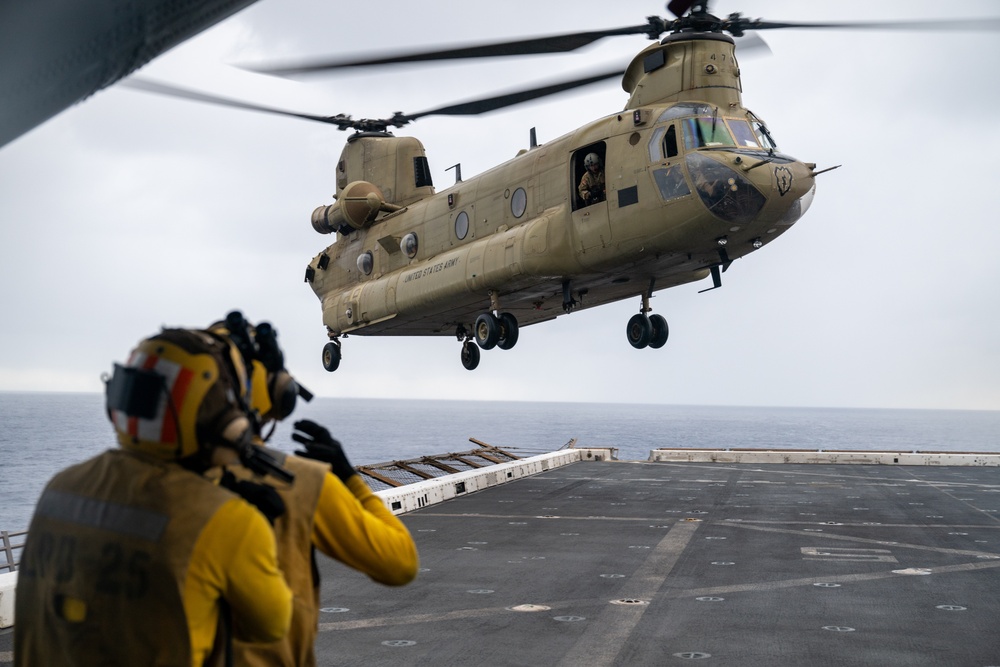 U.S. Army CH-47 Chinook and AH-64 Apache deck landing qualifications aboard USS Somerset