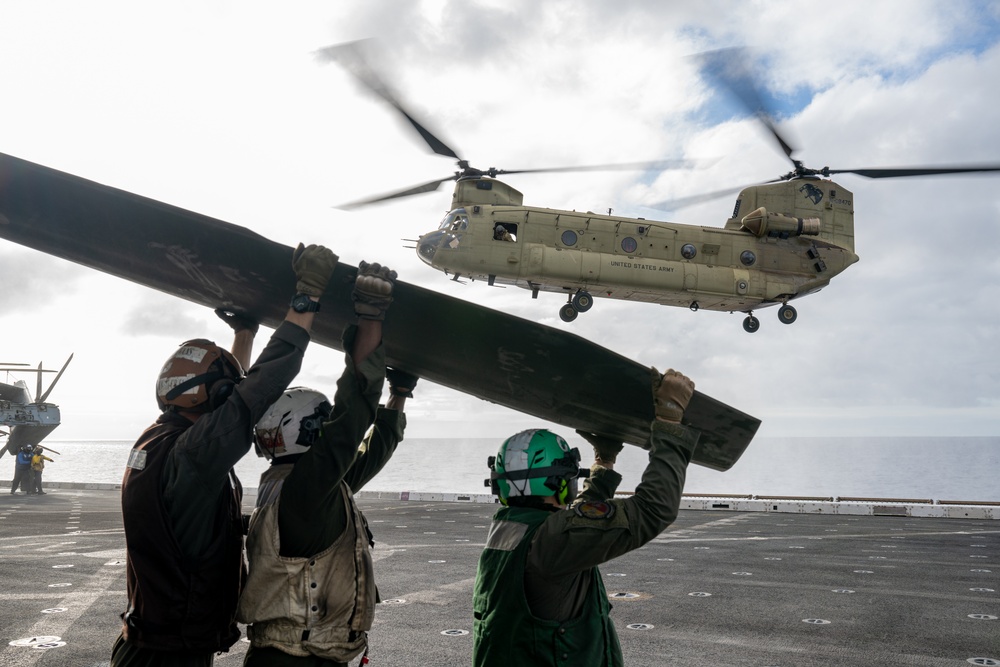 U.S. Army CH-47 Chinook and AH-64 Apache deck landing qualifications aboard USS Somerset
