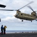 U.S. Army CH-47 Chinook and AH-64 Apache deck landing qualifications aboard USS Somerset