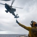 U.S. Army CH-47 Chinook and AH-64 Apache deck landing qualifications aboard USS Somerset