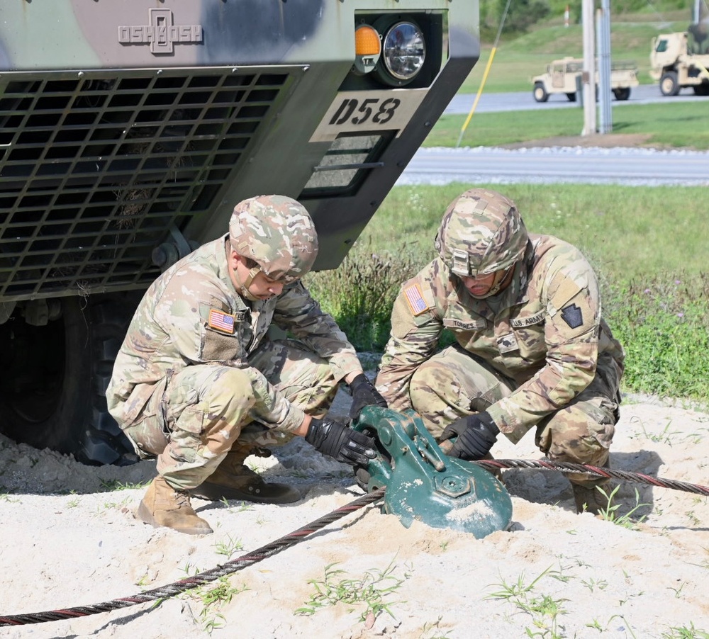 128th BSB trains in the mire pit