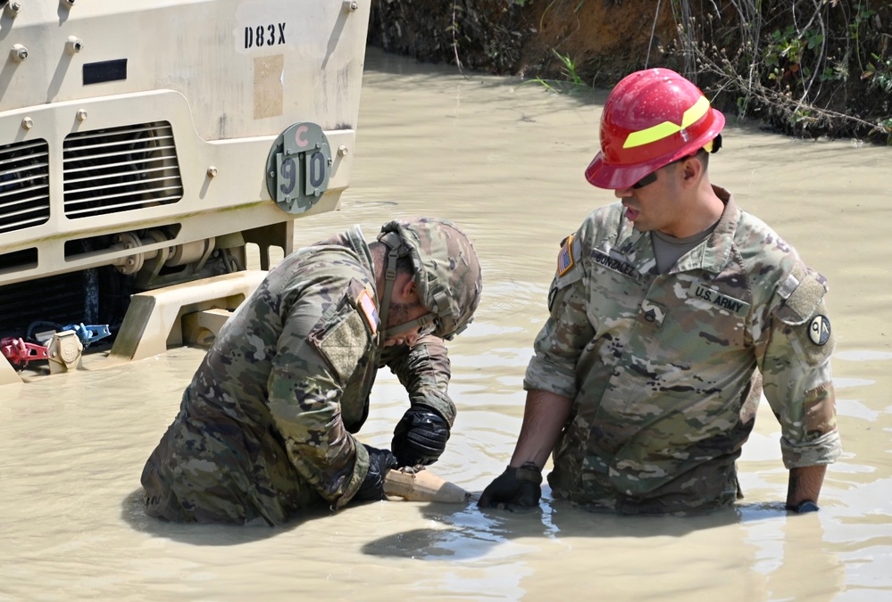 128th BSB trains in the mire pit