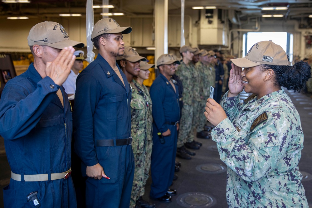 USS Tripoli Piping Ashore
