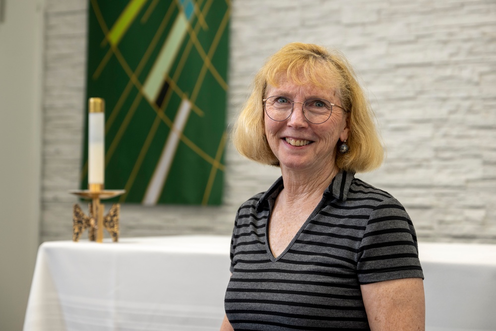 Dr. Grace Yeuel Stands in the Clay Kaserne Chapel