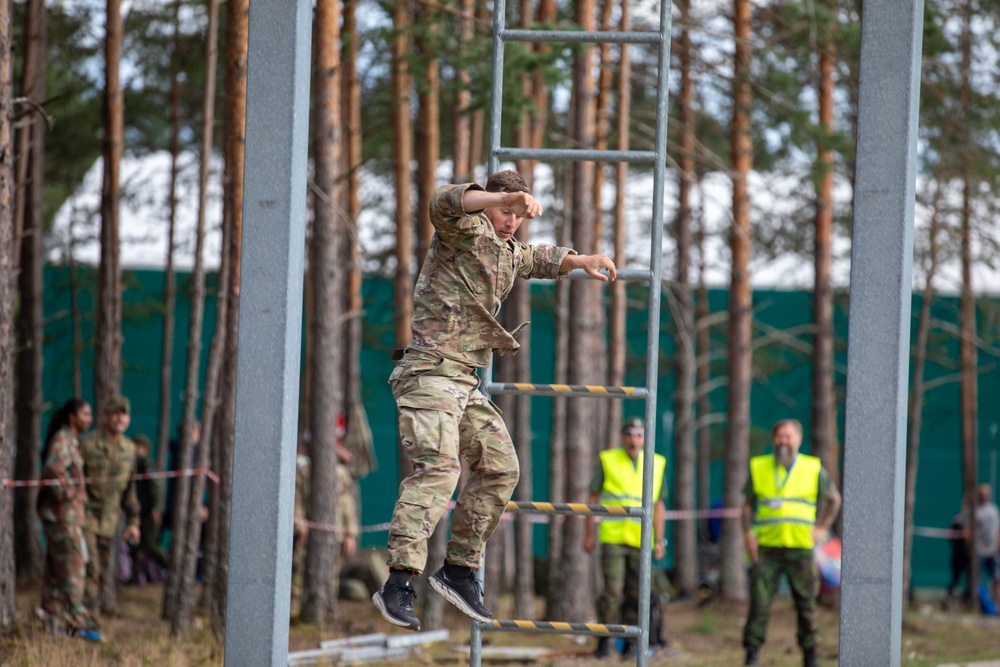 1st Lt. Layton Thorpe jumps off an obstacle