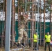 1st Lt. Layton Thorpe jumps off an obstacle