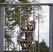 Sgt. 1st Class David Duran climbs up a ladder